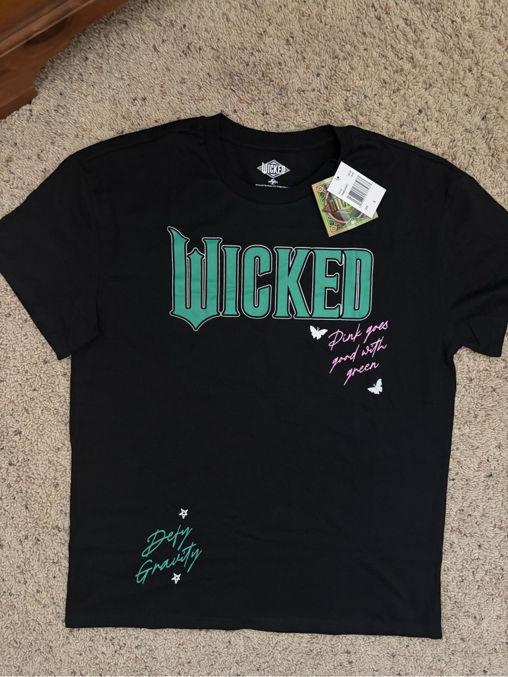 Wicked Graphic Tee — Black with Green Lettering